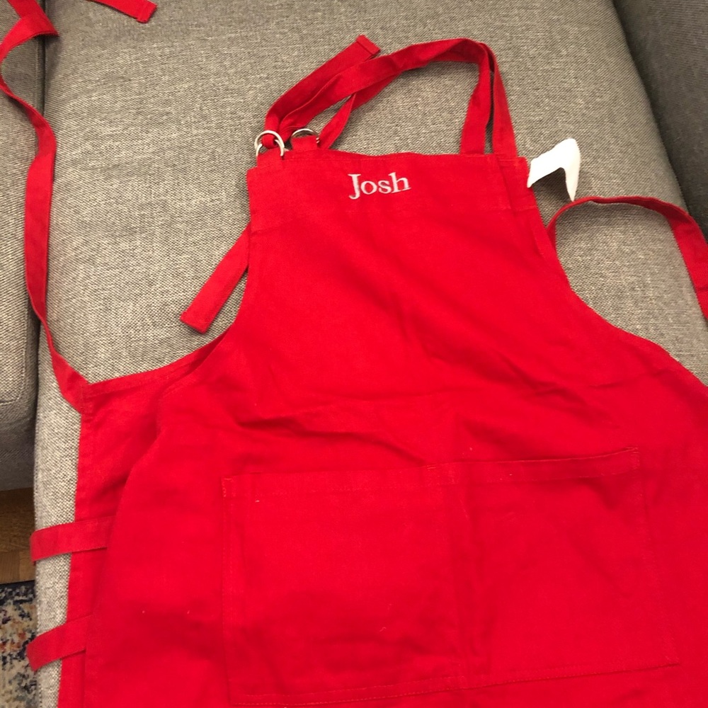 “Josh” personalizes red chefs apron